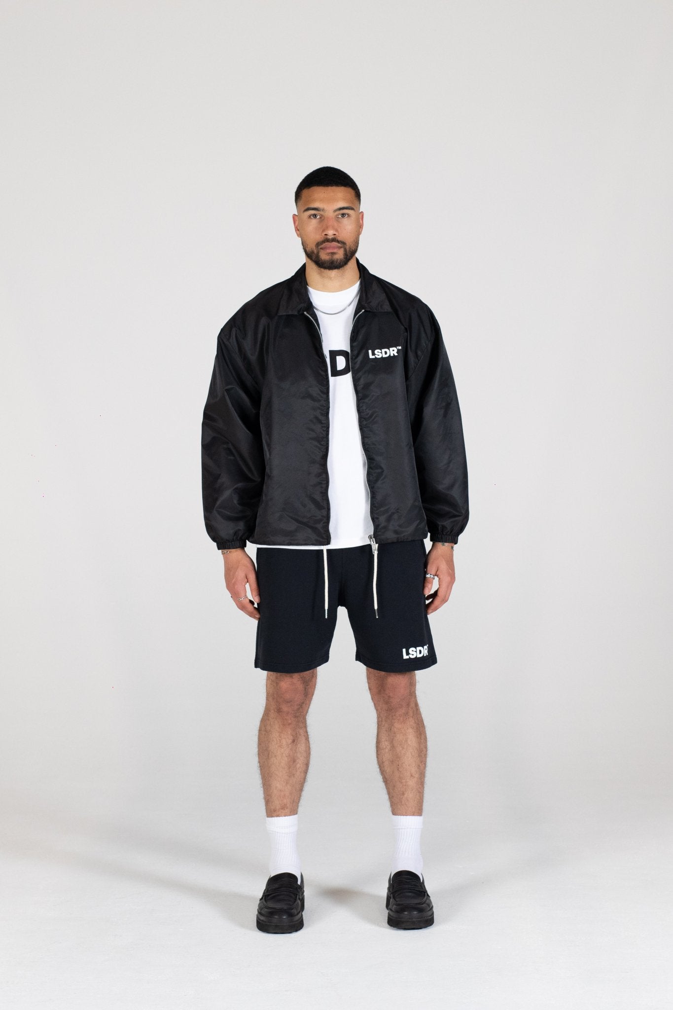 COACH JACKET LSDR - COACH JACKET LA SCENE DE RUE - OVERSIZED SUMMER JACKET LSDR - NYLON JACKET BLACK STREETWEAR OVERSIZED - FEAR OF GOD JACKET - OVERSIZED JACKET WITH COLLAR - OVERSIZED LOGO JACKET - REPRESENT COACH JACKET - POLYESTER JACKET STEETWEAR BLACK WHITE - JACKET WITH CORDS YKK ZIPPER