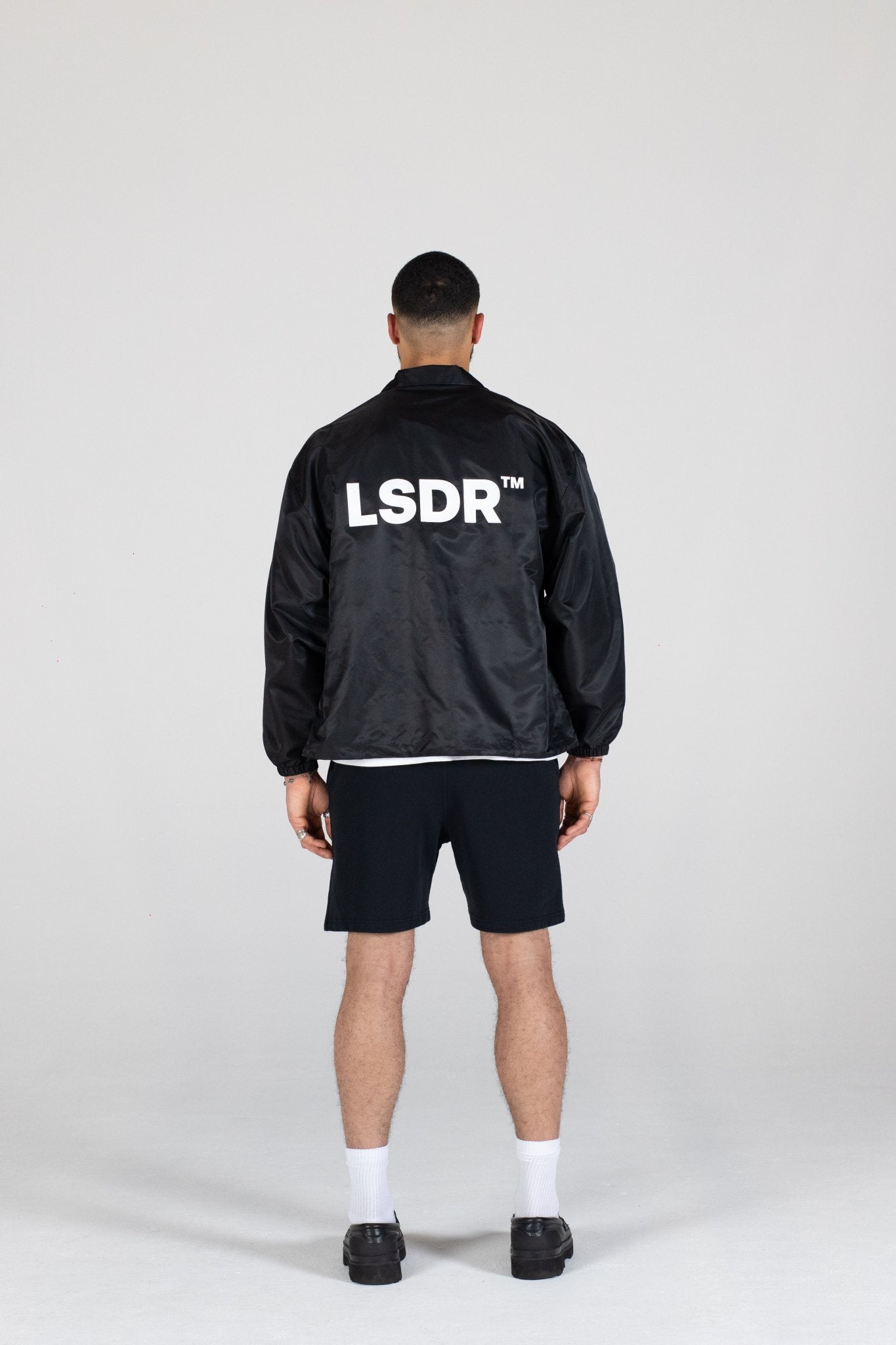 COACH JACKET LSDR - COACH JACKET LA SCENE DE RUE - OVERSIZED SUMMER JACKET LSDR - NYLON JACKET BLACK STREETWEAR OVERSIZED - FEAR OF GOD JACKET - OVERSIZED JACKET WITH COLLAR - OVERSIZED LOGO JACKET - REPRESENT COACH JACKET - POLYESTER JACKET STEETWEAR BLACK WHITE - JACKET WITH CORDS YKK ZIPPER