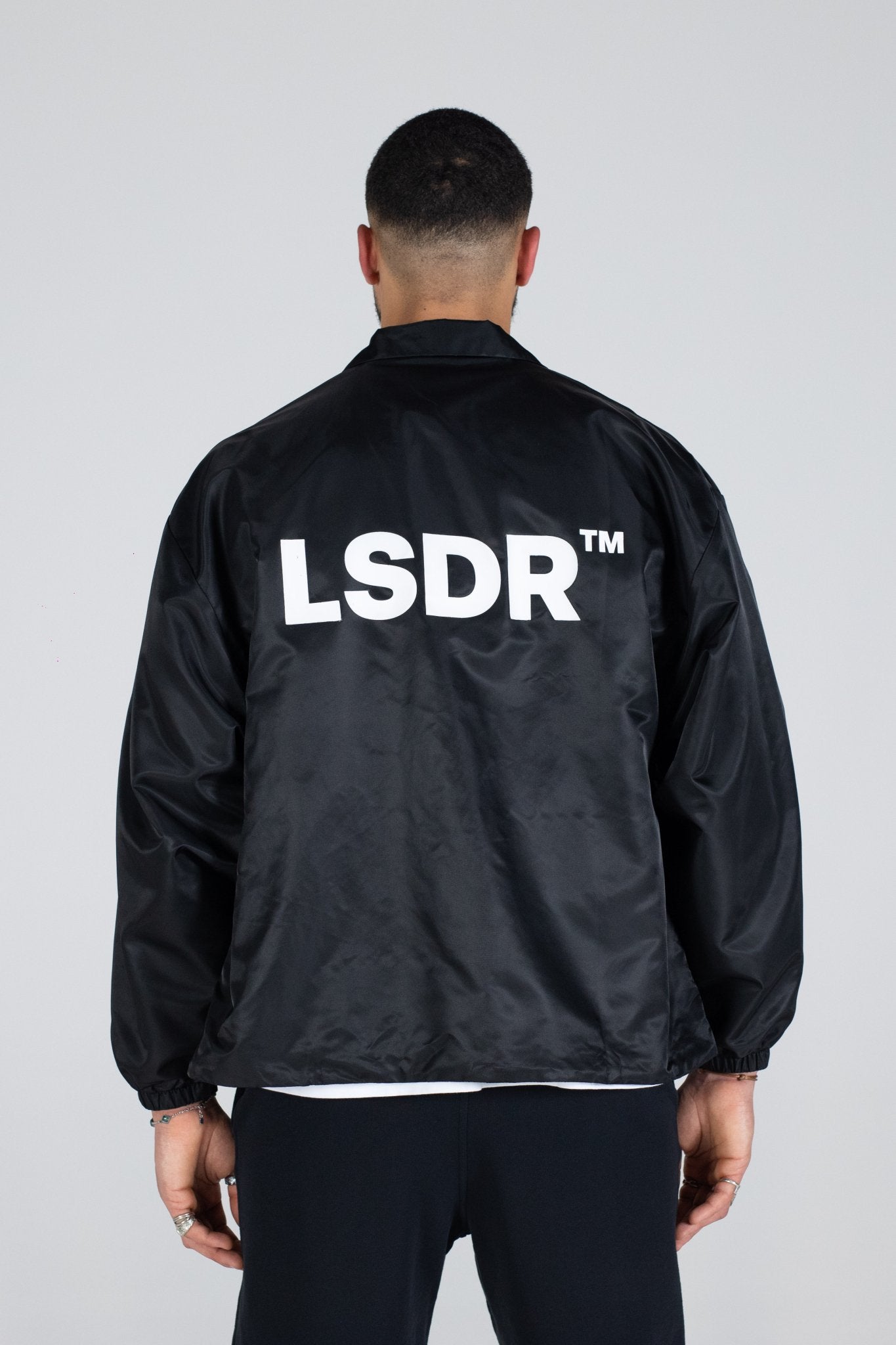 COACH JACKET LSDR - COACH JACKET LA SCENE DE RUE - OVERSIZED SUMMER JACKET LSDR - NYLON JACKET BLACK STREETWEAR OVERSIZED - FEAR OF GOD JACKET - OVERSIZED JACKET WITH COLLAR - OVERSIZED LOGO JACKET - REPRESENT COACH JACKET - POLYESTER JACKET STEETWEAR BLACK WHITE - JACKET WITH CORDS YKK ZIPPER