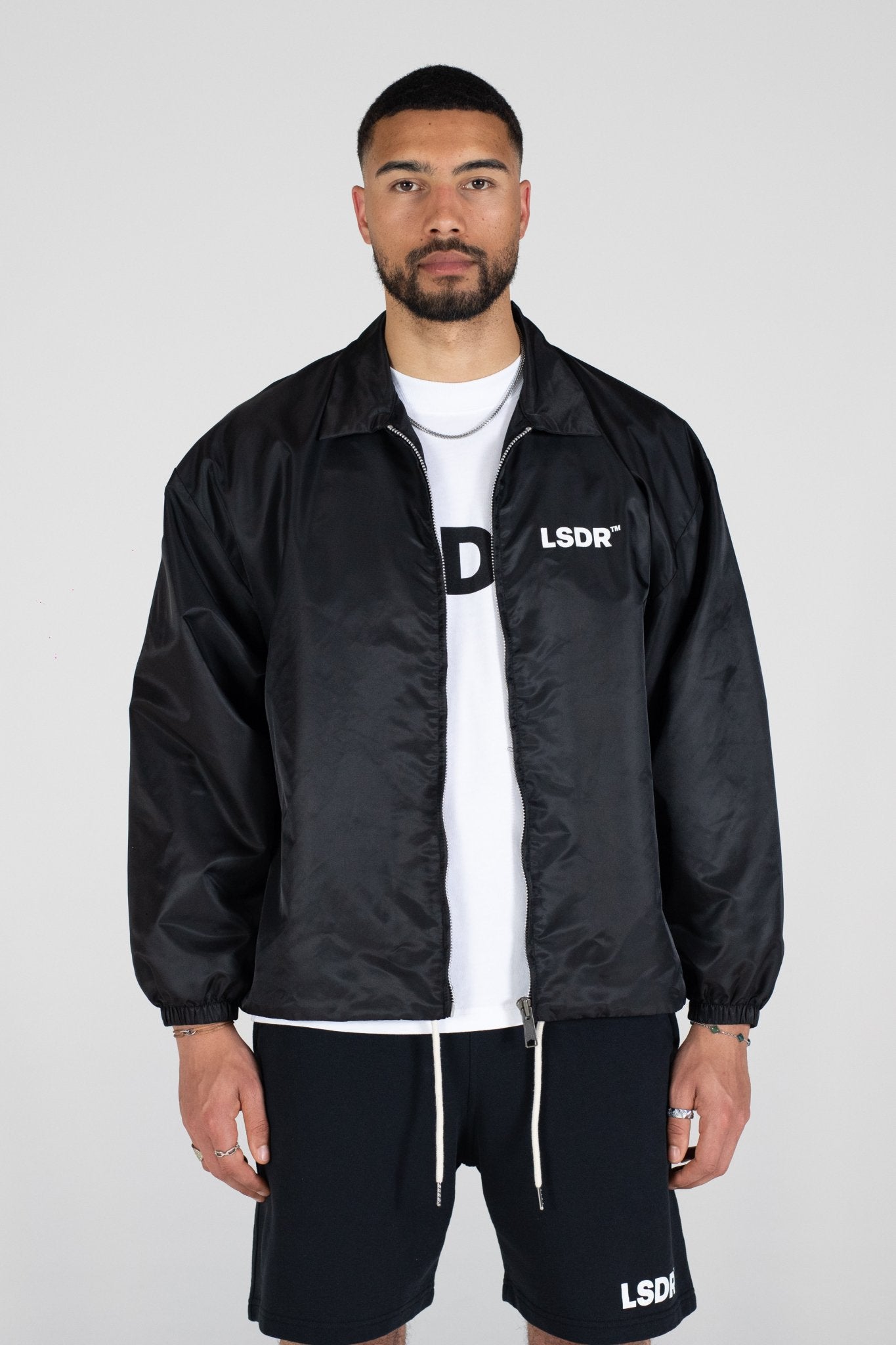 COACH JACKET LSDR - COACH JACKET LA SCENE DE RUE - OVERSIZED SUMMER JACKET LSDR - NYLON JACKET BLACK STREETWEAR OVERSIZED - FEAR OF GOD JACKET - OVERSIZED JACKET WITH COLLAR - OVERSIZED LOGO JACKET - REPRESENT COACH JACKET - POLYESTER JACKET STEETWEAR BLACK WHITE - JACKET WITH CORDS YKK ZIPPER
